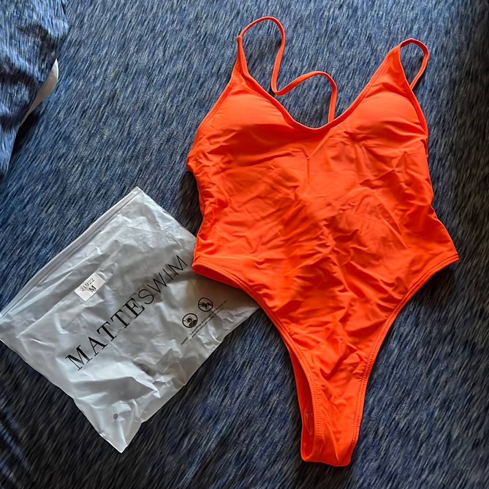 Brand new one piece. Size Medium. Better offer